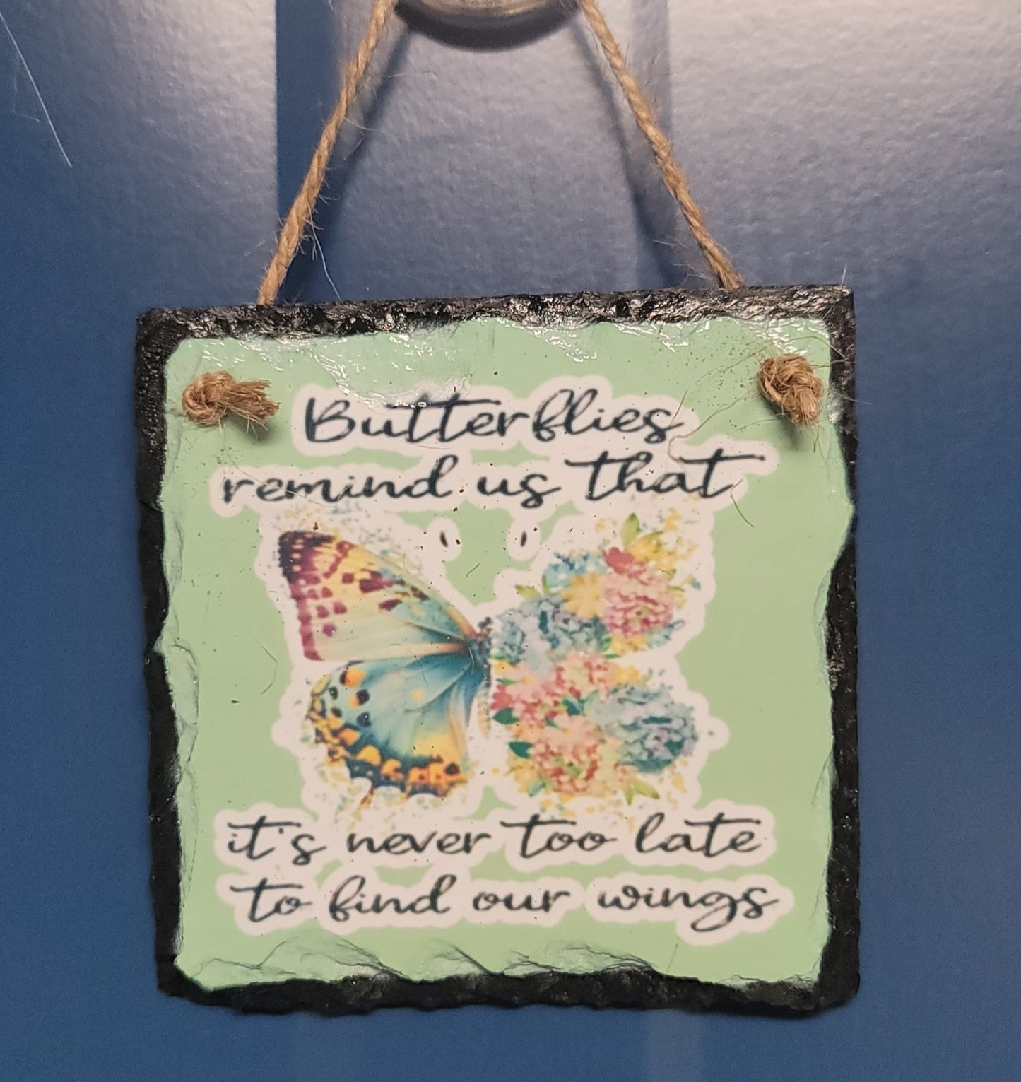 Butterflies remind us hanging slate green