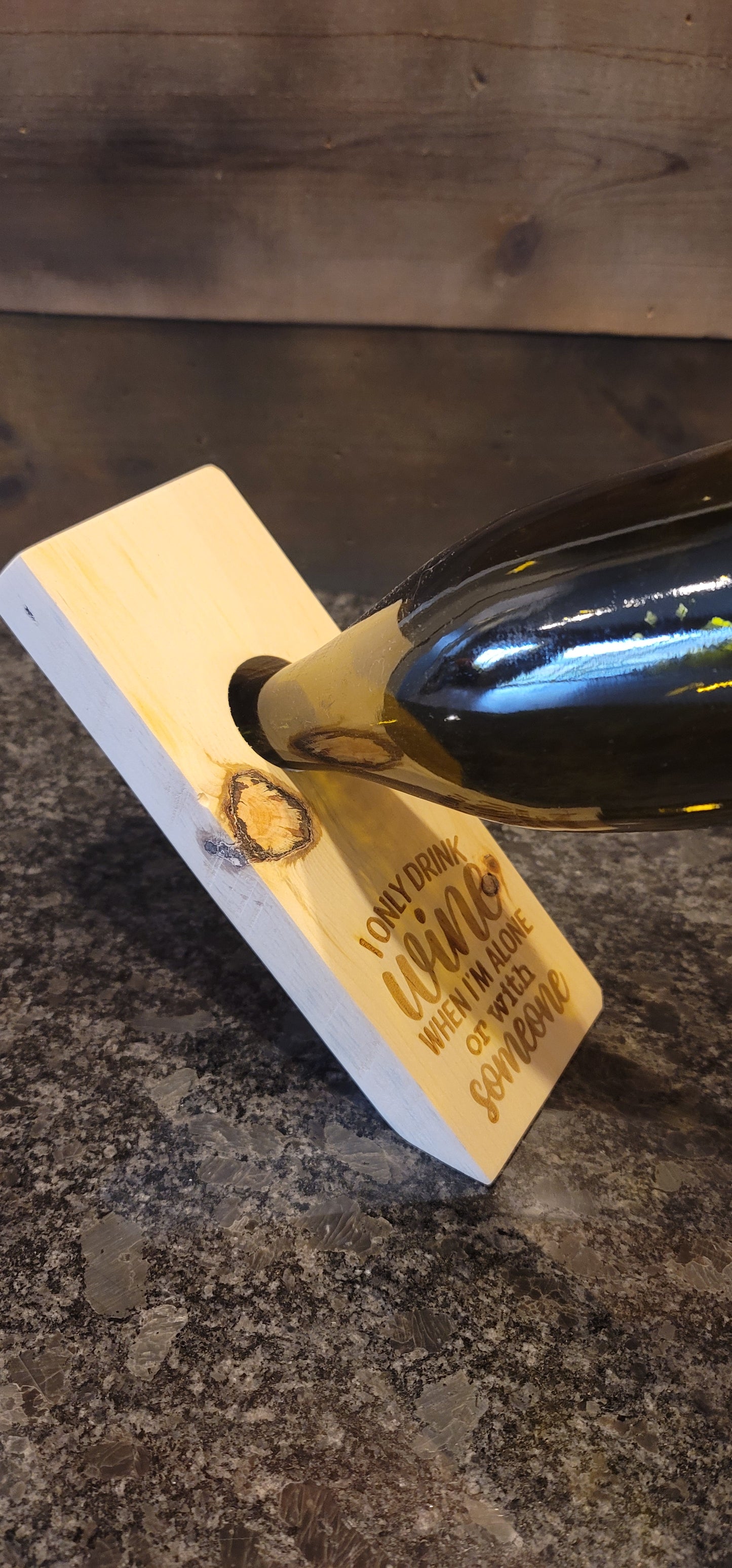 Floating wine bottle holder