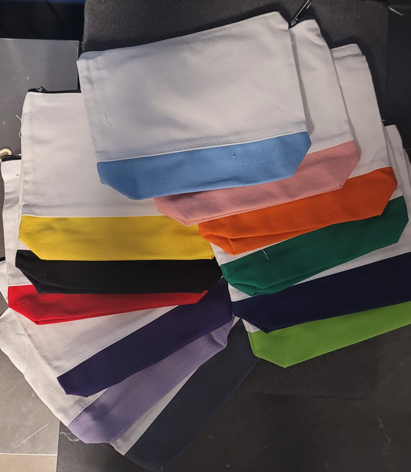 Zippered bag with colored bottom